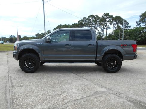 Used 2019 Ford F150 4x4 SuperCrew Lariat image 1