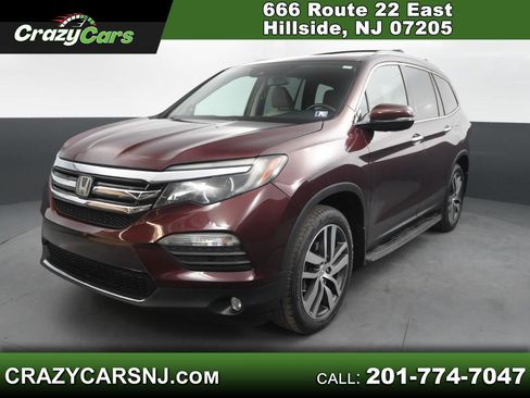 Used 2016 Honda Pilot Touring image 1