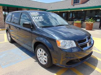 Used 2014 Dodge Grand Caravan SE image 1