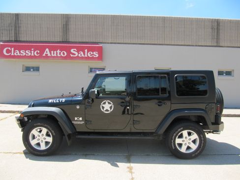 Used 2009 Jeep Wrangler 4WD Unlimited X image 1