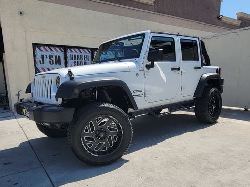 Used 2012 Jeep Wrangler Unlimited Sport image 1