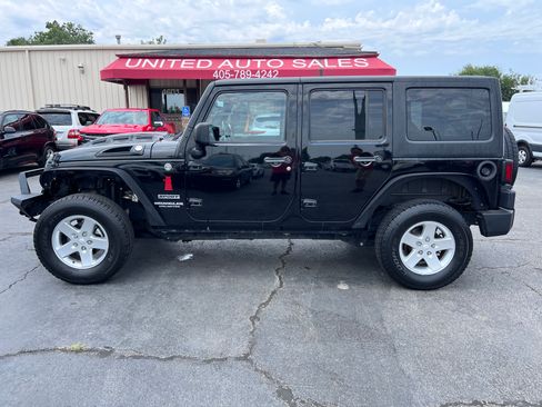 Used 2015 Jeep Wrangler 4WD Unlimited Sport image 1