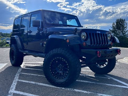 Used 2013 Jeep Wrangler Unlimited Sahara image 1