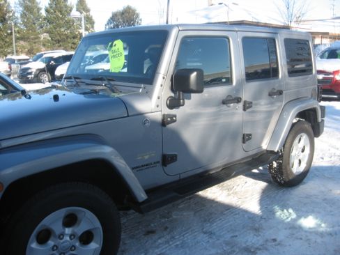 Used 2014 Jeep Wrangler 4xe Unlimited Sahara image 1
