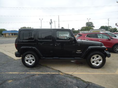 Used 2014 Jeep Wrangler 4WD Unlimited Sahara image 1