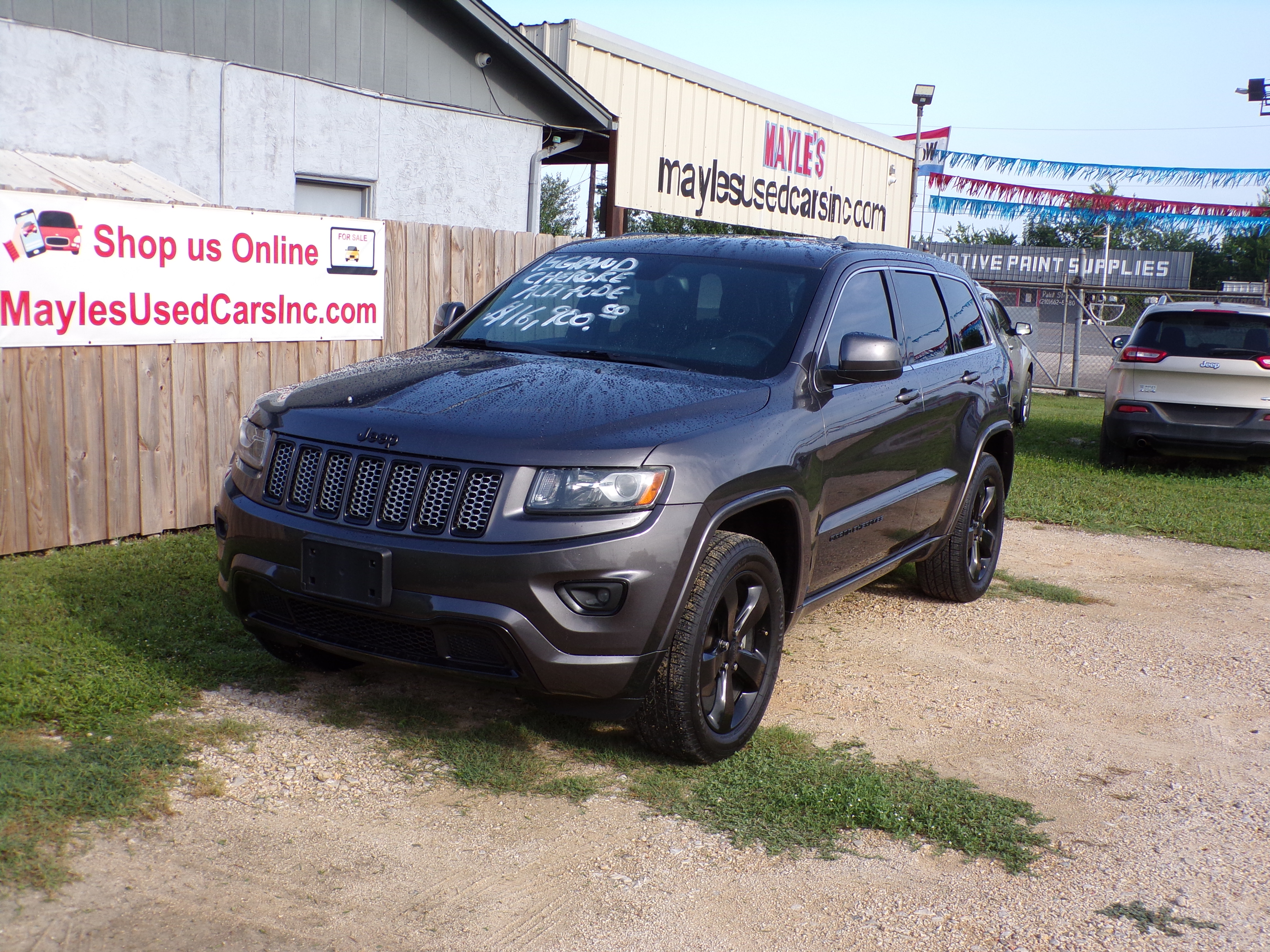 Used 2015 Jeep Grand Cherokee Altitude RWD image 1