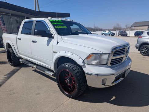 Used 2015 RAM 1500 SLT image 1