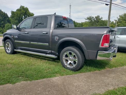 Used 2014 RAM 1500 4x4 Crew Cab Laramie image 1