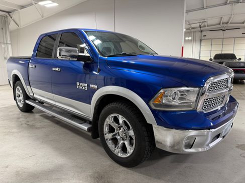Used 2015 RAM 1500 4x4 Crew Cab Laramie image 1
