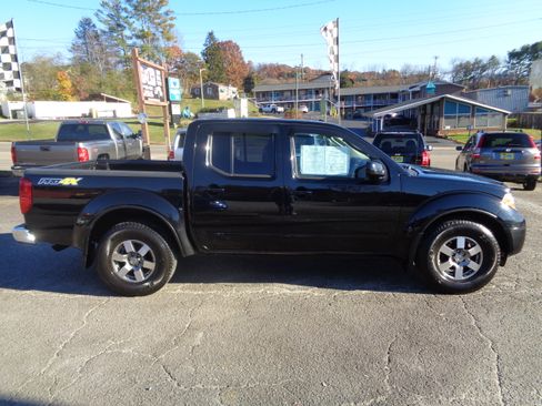 Used 2011 Nissan Frontier PRO-4X image 1