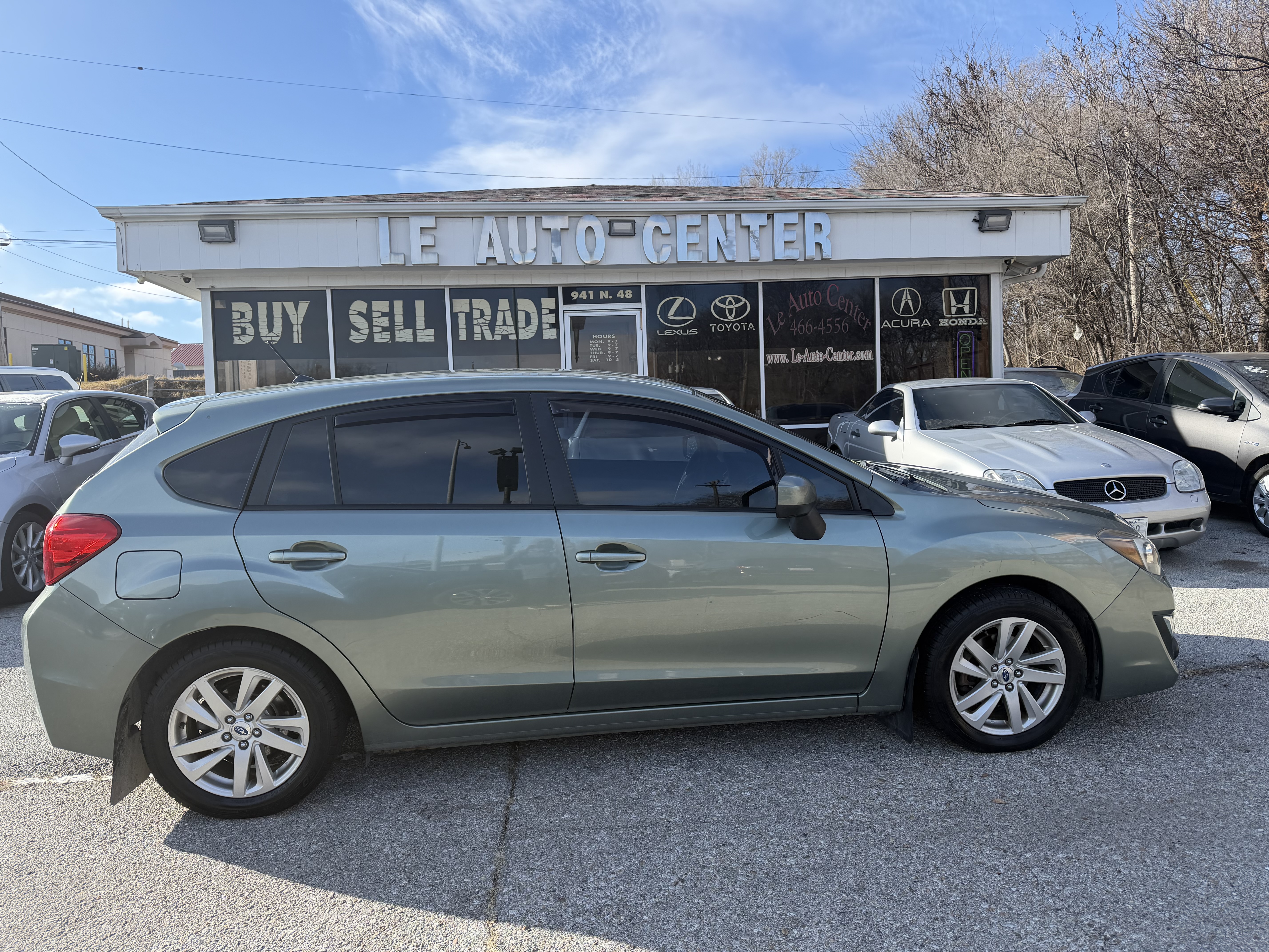 Used 2015 Subaru Impreza 2.0i Premium AWD/4WD image 1