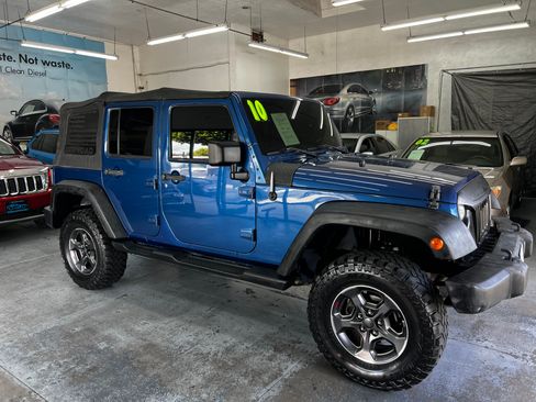 Used 2010 Jeep Wrangler Unlimited Sport image 1