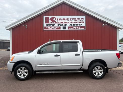 Used 2014 Nissan Titan 4x4 Crew Cab image 1