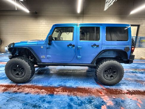 Used 2014 Jeep Wrangler Unlimited Sahara image 1