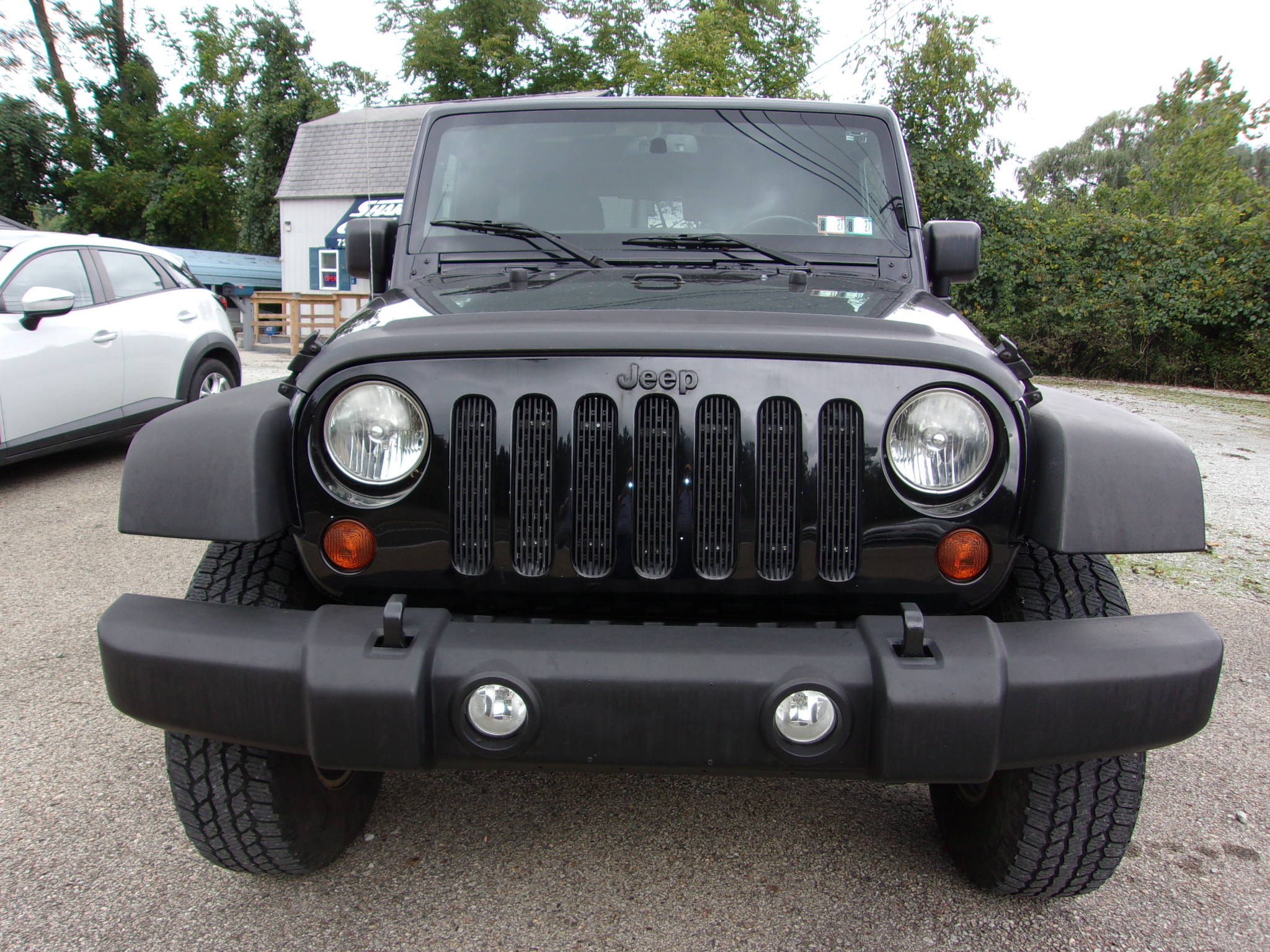 Used 2013 Jeep Wrangler 4WD Unlimited Sport image 1