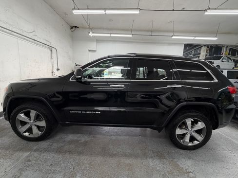 Used 2014 Jeep Grand Cherokee 4WD Limited image 1