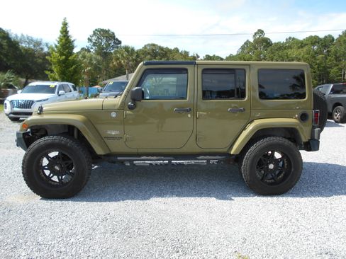 Used 2013 Jeep Wrangler 4WD Unlimited Sahara image 1
