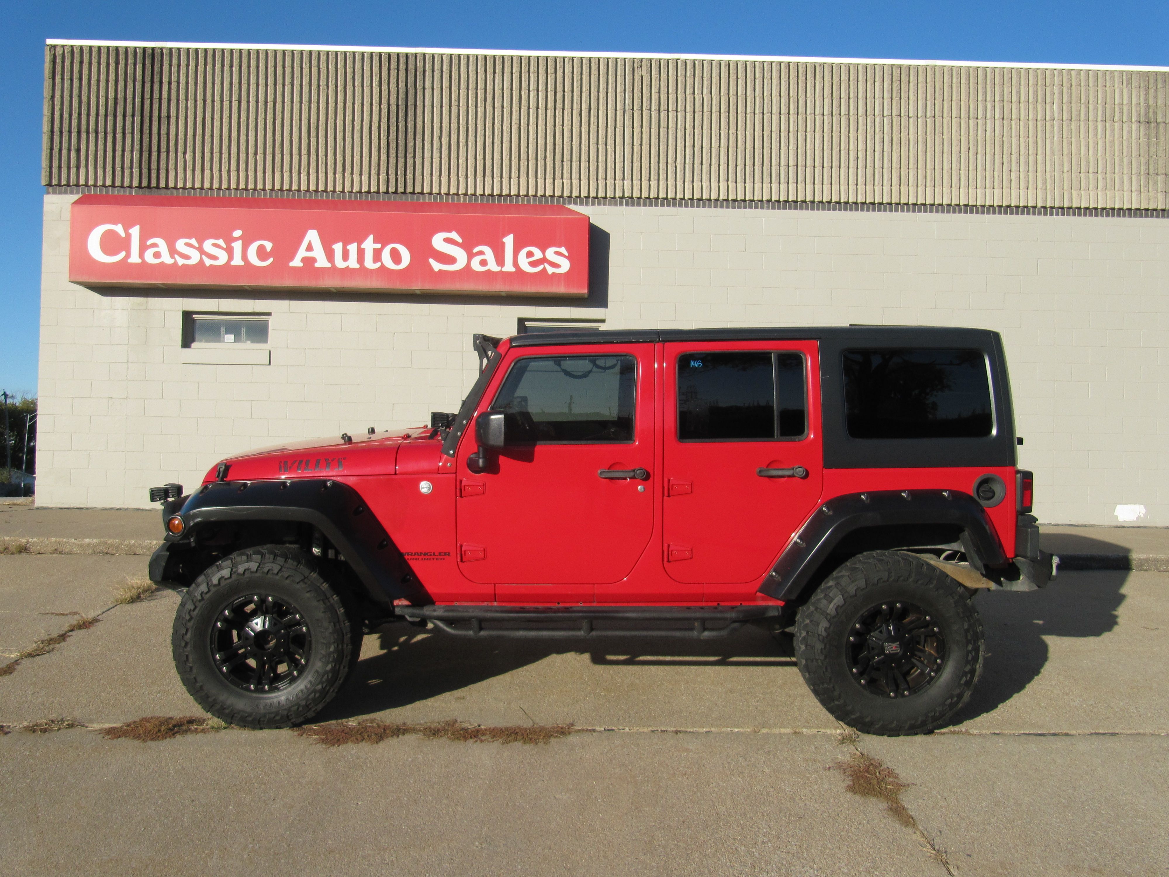 Used 2015 Jeep Wrangler Unlimited Willys Wheeler AWD/4WD image 1