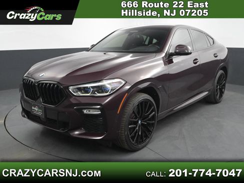 Used 2021 BMW X6 M50i image 1