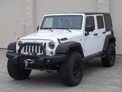 Used 2017 Jeep Wrangler 4WD Unlimited Sport image 1