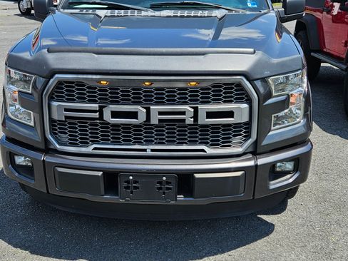 Used 2015 Ford F150 4x4 SuperCrew image 1