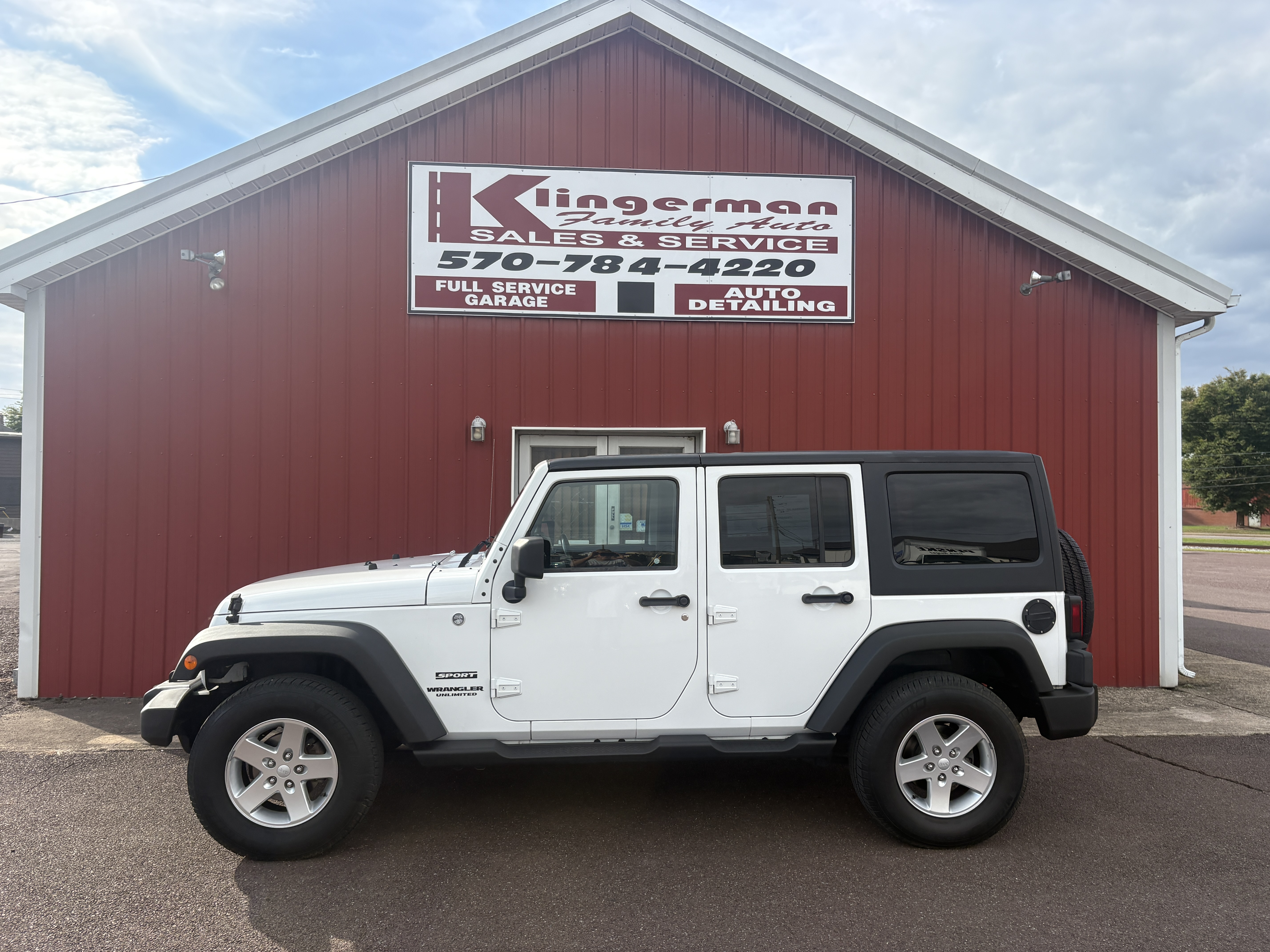 Used 2014 Jeep Wrangler 4WD Unlimited Sport image 1