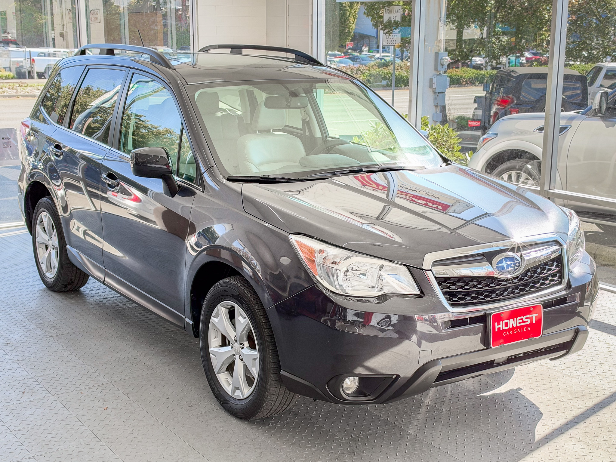 Used 2014 Subaru Forester 2.5i Limited AWD/4WD image 1