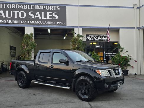 Used 2012 Nissan Frontier SV image 1