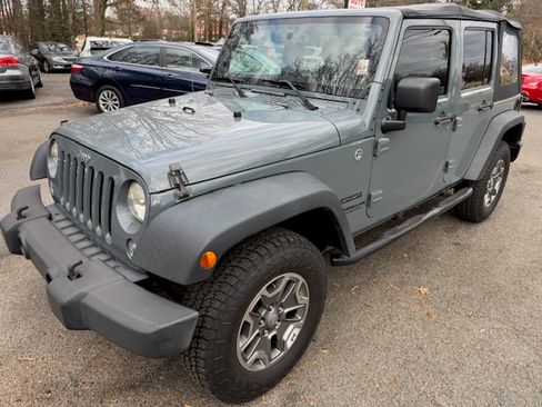 Used 2014 Jeep Wrangler Unlimited Sport image 1