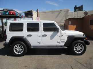 Used 2018 Jeep Wrangler Unlimited Sahara image 1