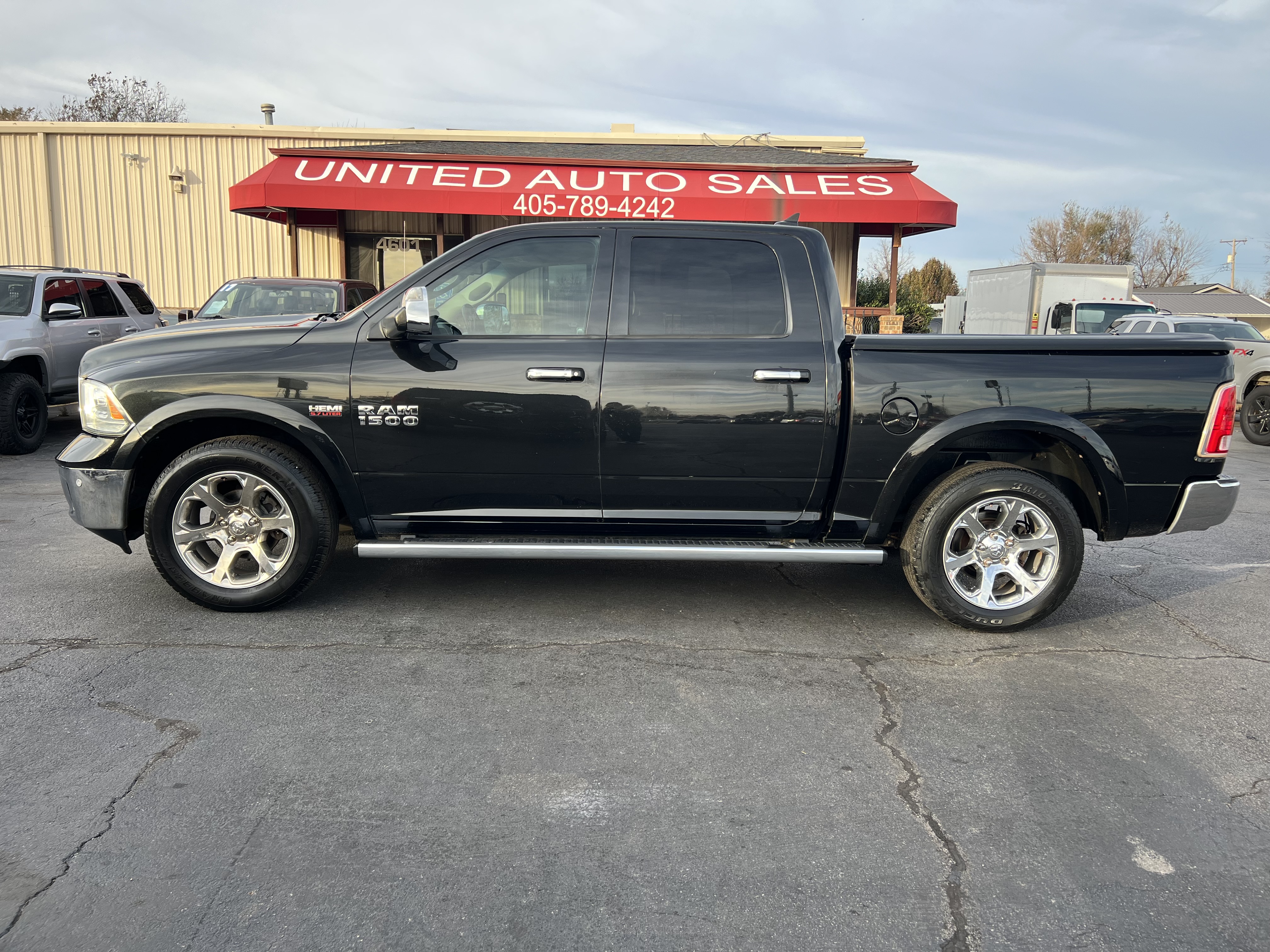 Used 2015 RAM 1500 Laramie AWD/4WD image 1