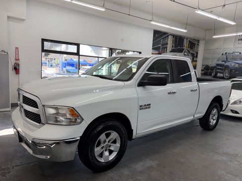 Used 2018 RAM 1500 2WD Quad Cab SLT image 1