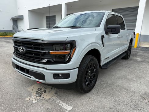 Used 2024 Ford F150 4x4 SuperCrew XLT Hybrid image 1