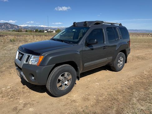 Used 2011 Nissan Xterra 4WD PRO-4X image 1