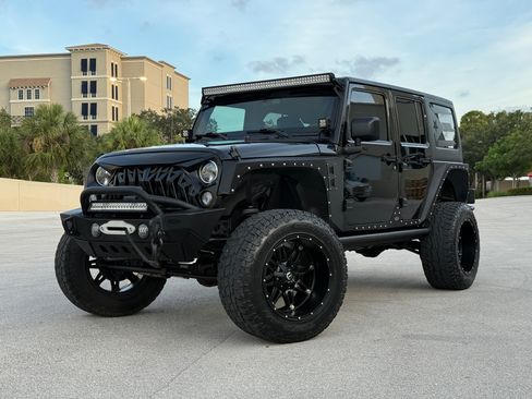 Used 2015 Jeep Wrangler 4WD Unlimited Sport image 1