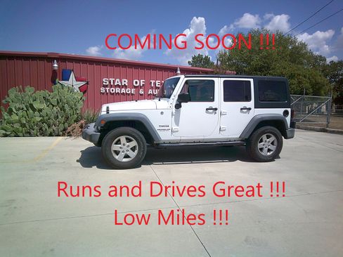 Used 2016 Jeep Wrangler 4WD Unlimited Sport image 1