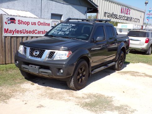 Used 2013 Nissan Frontier PRO-4X image 1
