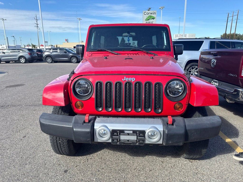 Used 2012 Jeep Wrangler Unlimited Sahara w/ Dual Top Group AWD/4WD image 2