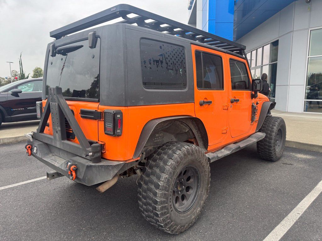 Used 2012 Jeep Wrangler Unlimited Sahara w/ Connectivity Group AWD/4WD image 2