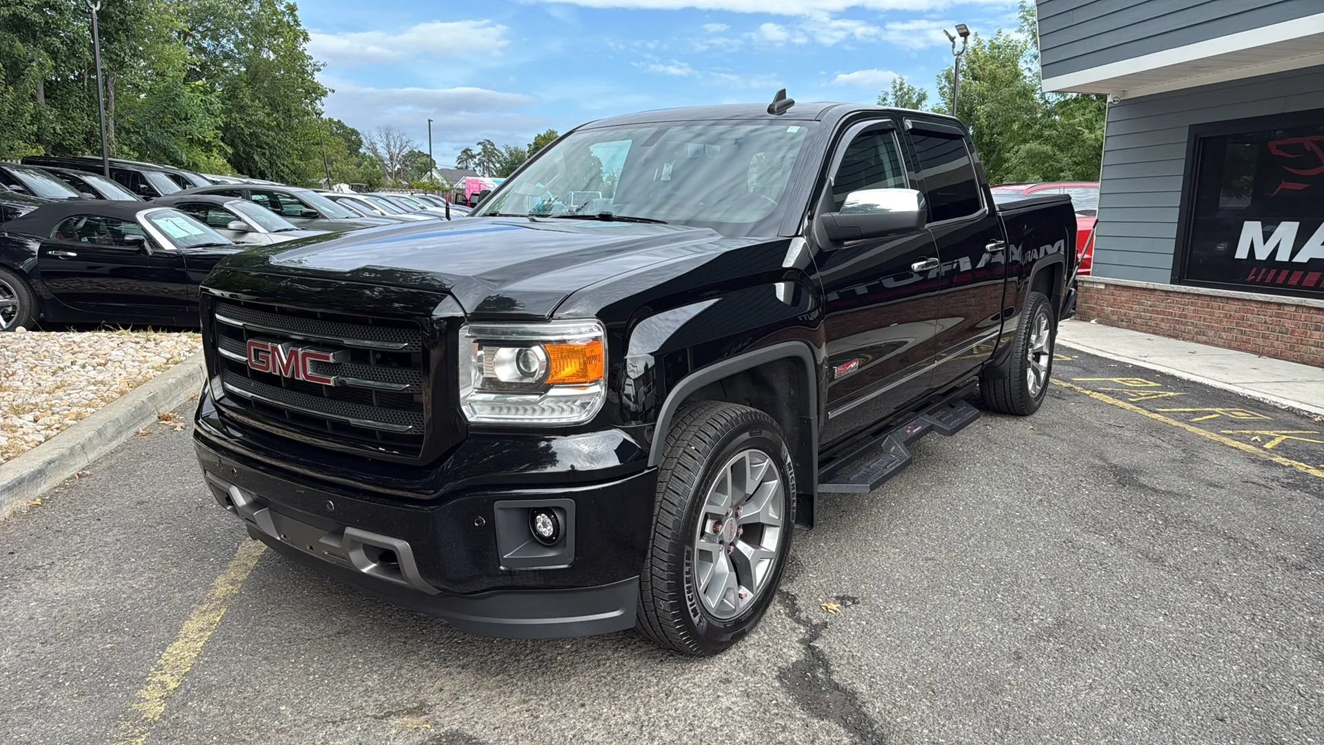 Used 2015 GMC Sierra 1500 SLT AWD/4WD image 1