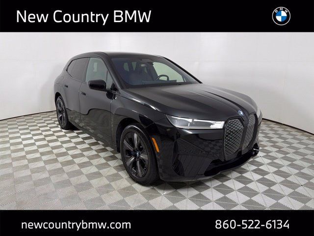 Used 2024 BMW iX xDrive50 w/ Sport Package AWD/4WD image 1