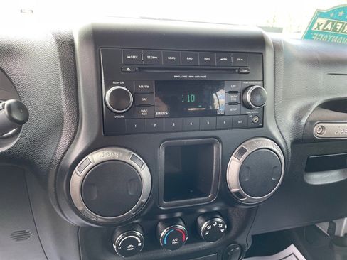 Used 2012 Jeep Wrangler Unlimited Sport w/ Black Appearance Group image 14