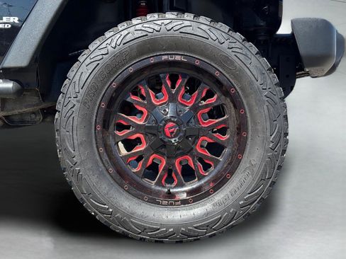 Used 2012 Jeep Wrangler Unlimited Sport w/ Black Appearance Group AWD/4WD image 9