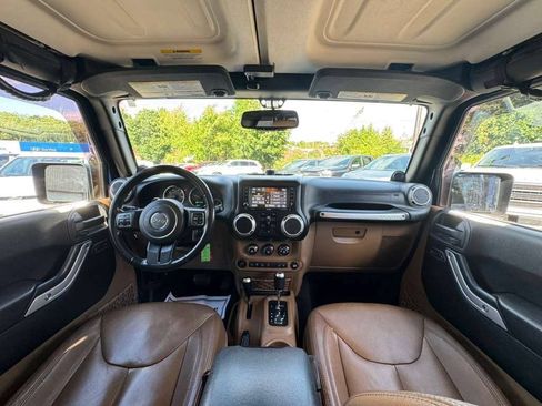 Used 2013 Jeep Wrangler Unlimited Sahara w/ Dual Top Group AWD/4WD image 22