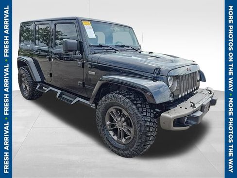 Used 2016 Jeep Wrangler Unlimited Sahara AWD/4WD image 1