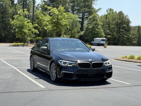 Used 2020 BMW M550i xDrive w/ Executive Package AWD/4WD image 1