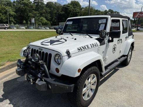 Used 2013 Jeep Wrangler Unlimited Sahara w/ Dual Top Group AWD/4WD image 2