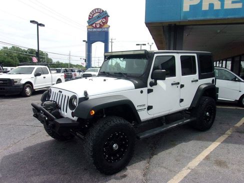 Used 2013 Jeep Wrangler Unlimited Sport w/ Connectivity Group AWD/4WD image 1