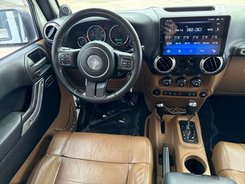 Used 2012 Jeep Wrangler Unlimited Sahara w/ Dual Top Group AWD/4WD image 25
