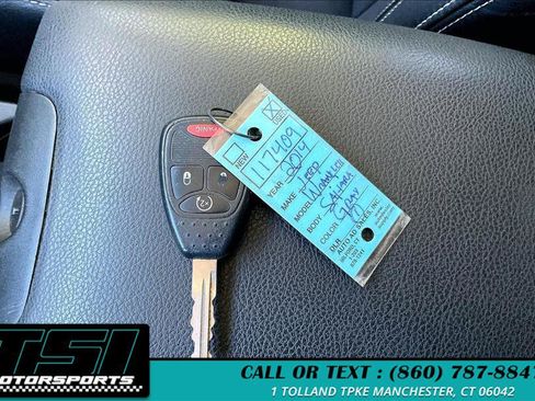 Used 2014 Jeep Wrangler Unlimited Sahara w/ Dual Top Group AWD/4WD image 9
